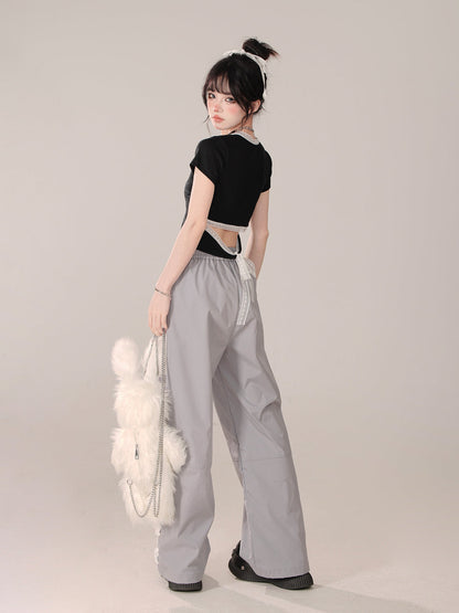 Schwarze Oberteile mit kurzem Design von Little Short Angel