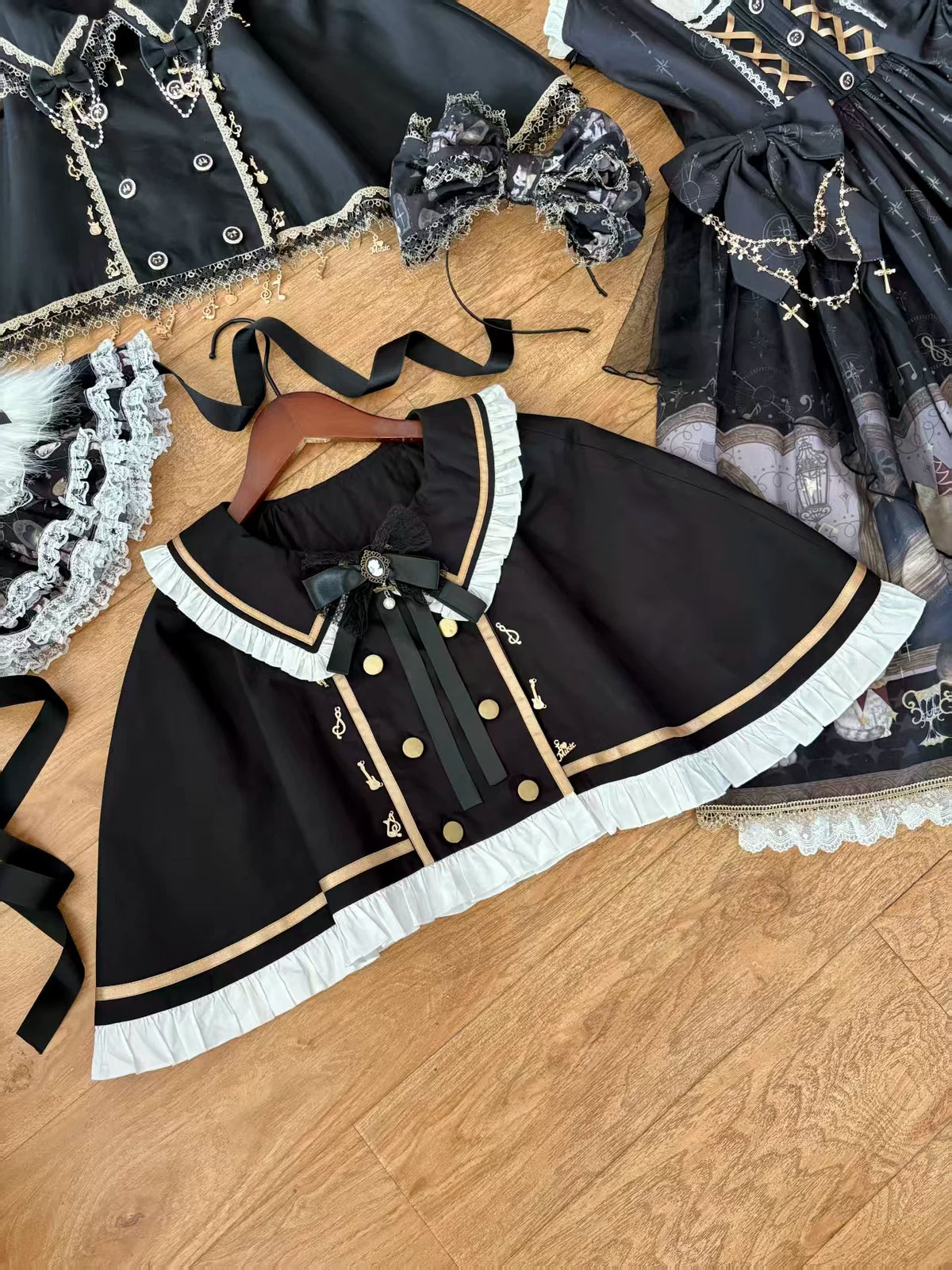 White-lace Cat Choir cape laid flat