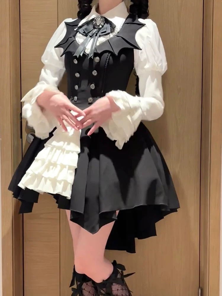 Black Gothic bat Lolita JSK and white hime-sleeve blouse, front view