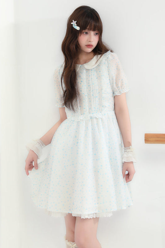 Puppe Ecosta Blumenkleid transparent