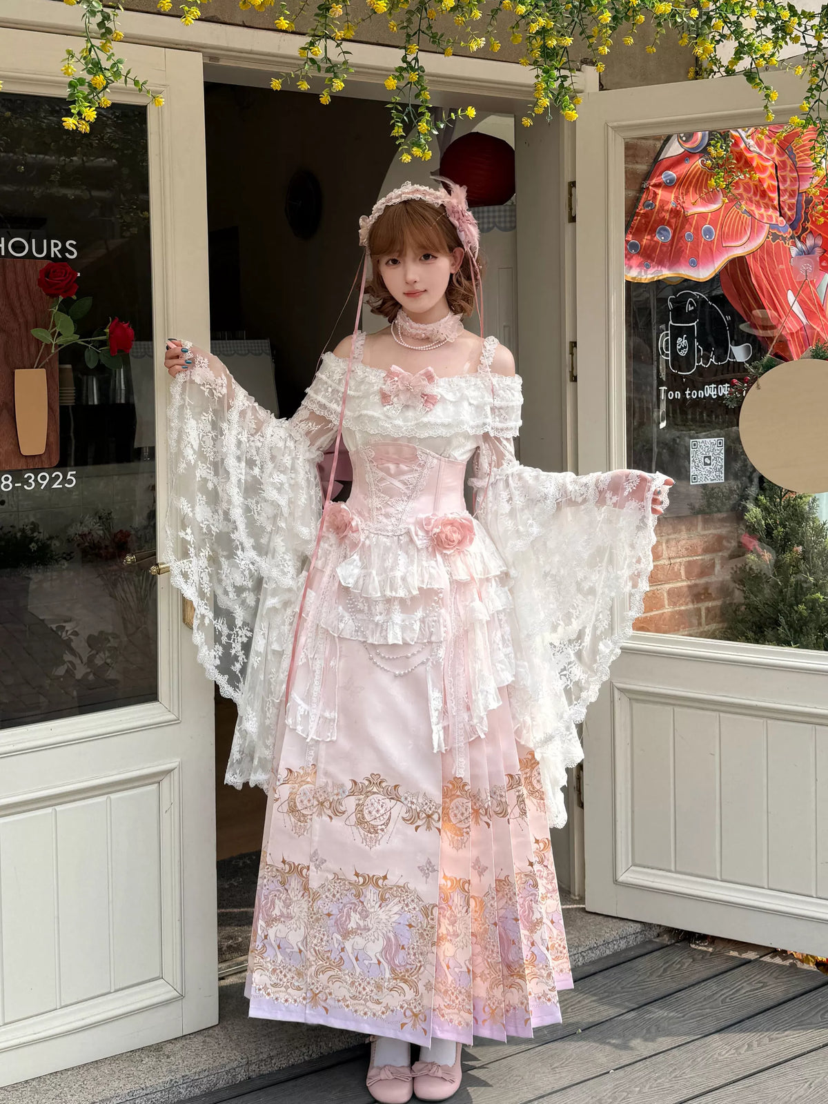 Molly Manor blouse, corset and patterned pink skirt full outfit styling