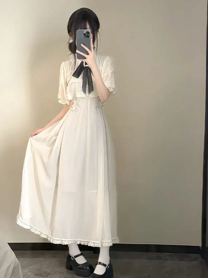 Rojita Cape Sleeve Mesh Bow Lace Midi Dress
