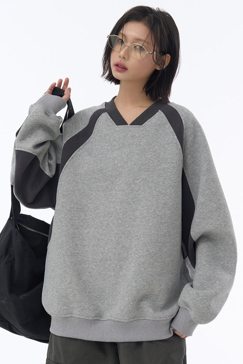 Patchwork-Pullover mit V-Ausschnitt