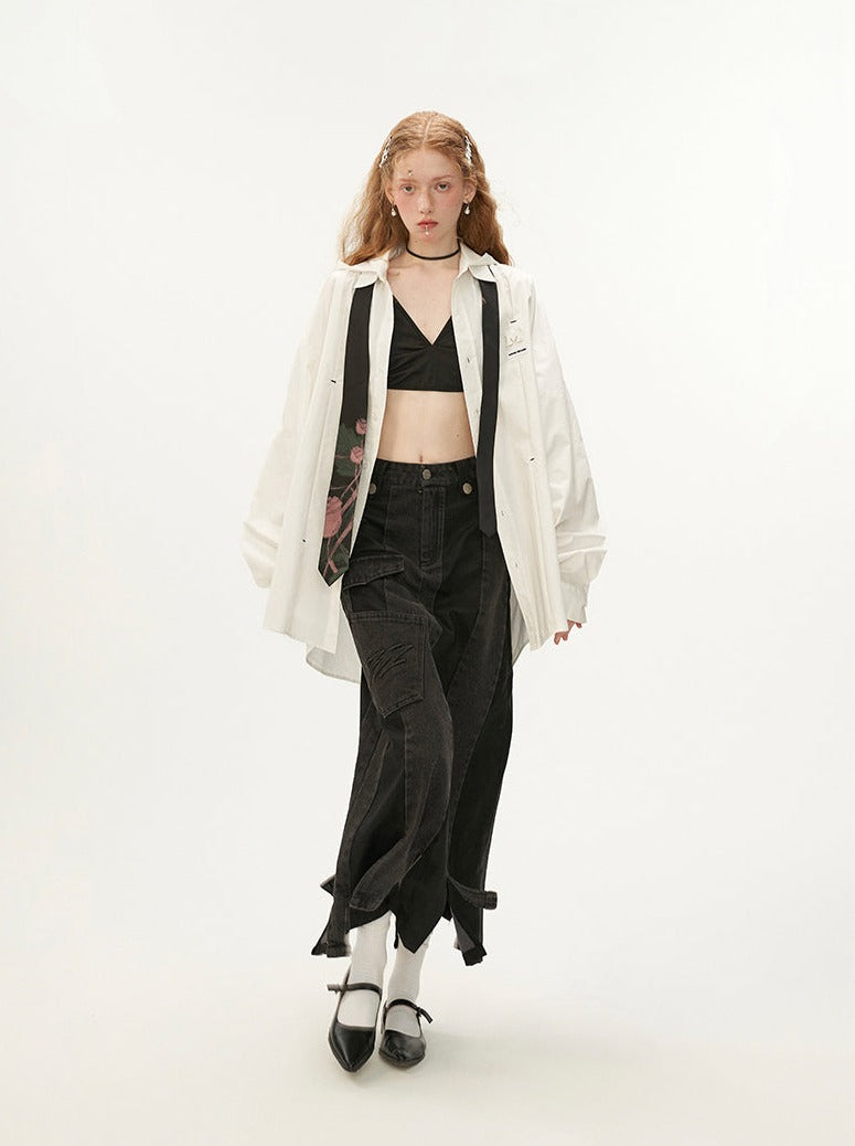 Schwarzer asymmetrischer Jeansrock aus Leder