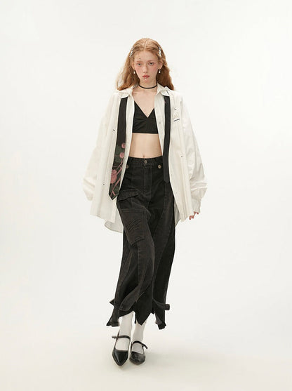 Schwarzer asymmetrischer Jeansrock aus Leder