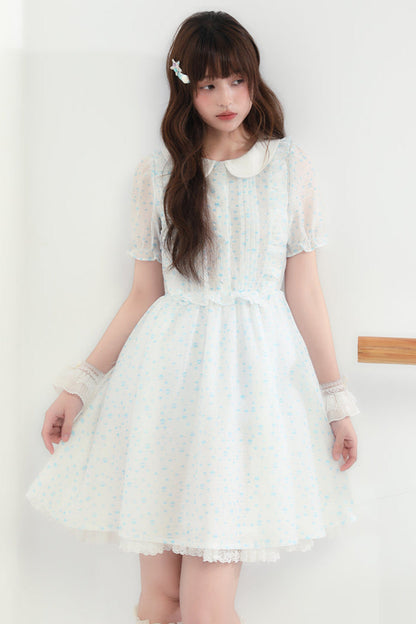 Puppe Ecosta Blumenkleid transparent