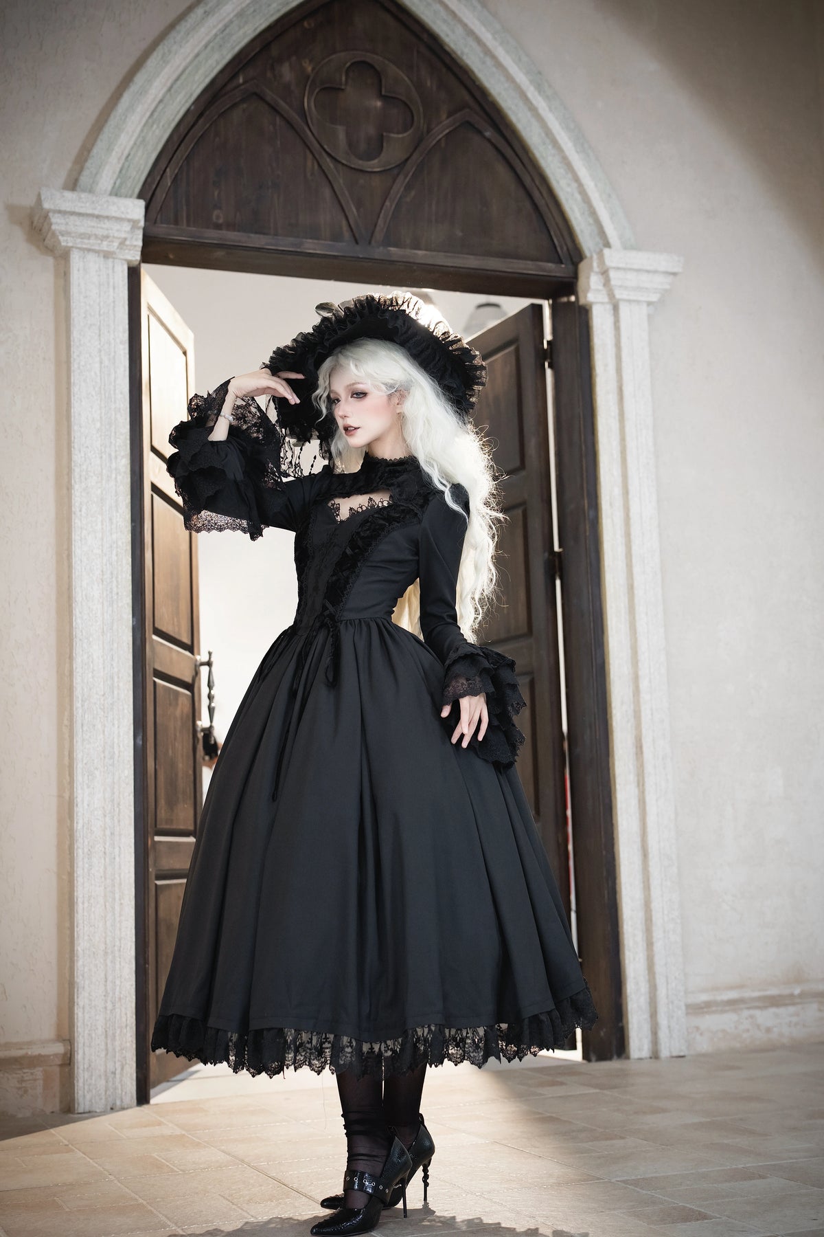 Full-length view of the black No Man's Land Rose OP dress