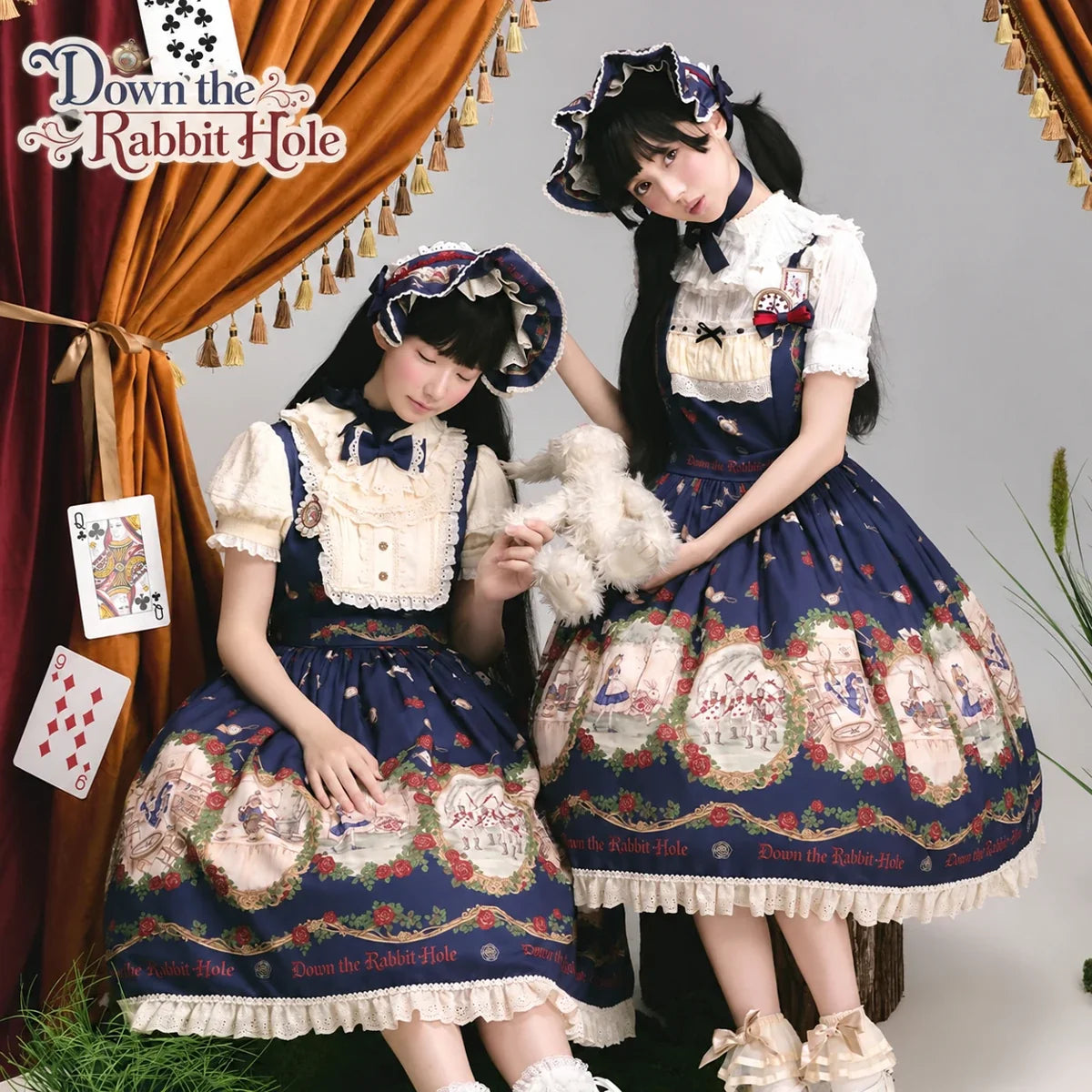 Navy storybook-print OP and JSK dresses with matching headwear