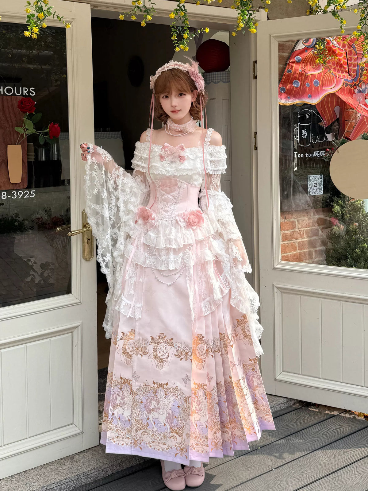 Front view of pink unicorn mamian skirt and lace princess-sleeve blouse