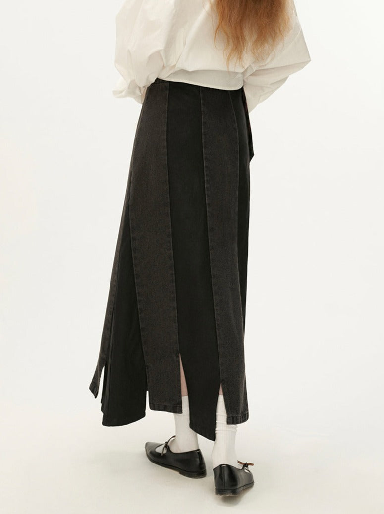 Schwarzer asymmetrischer Jeansrock aus Leder