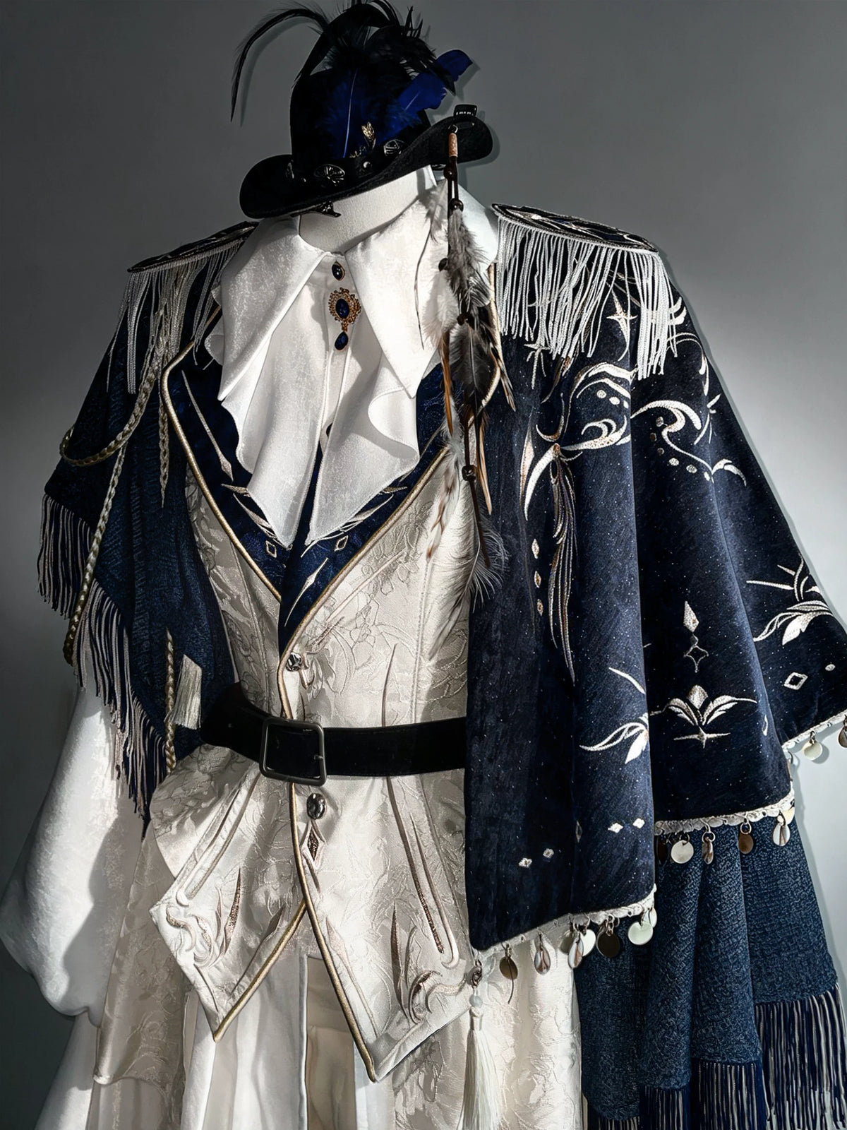Navy cape, jazz hat and brooch detail — ZERO The Fool collection