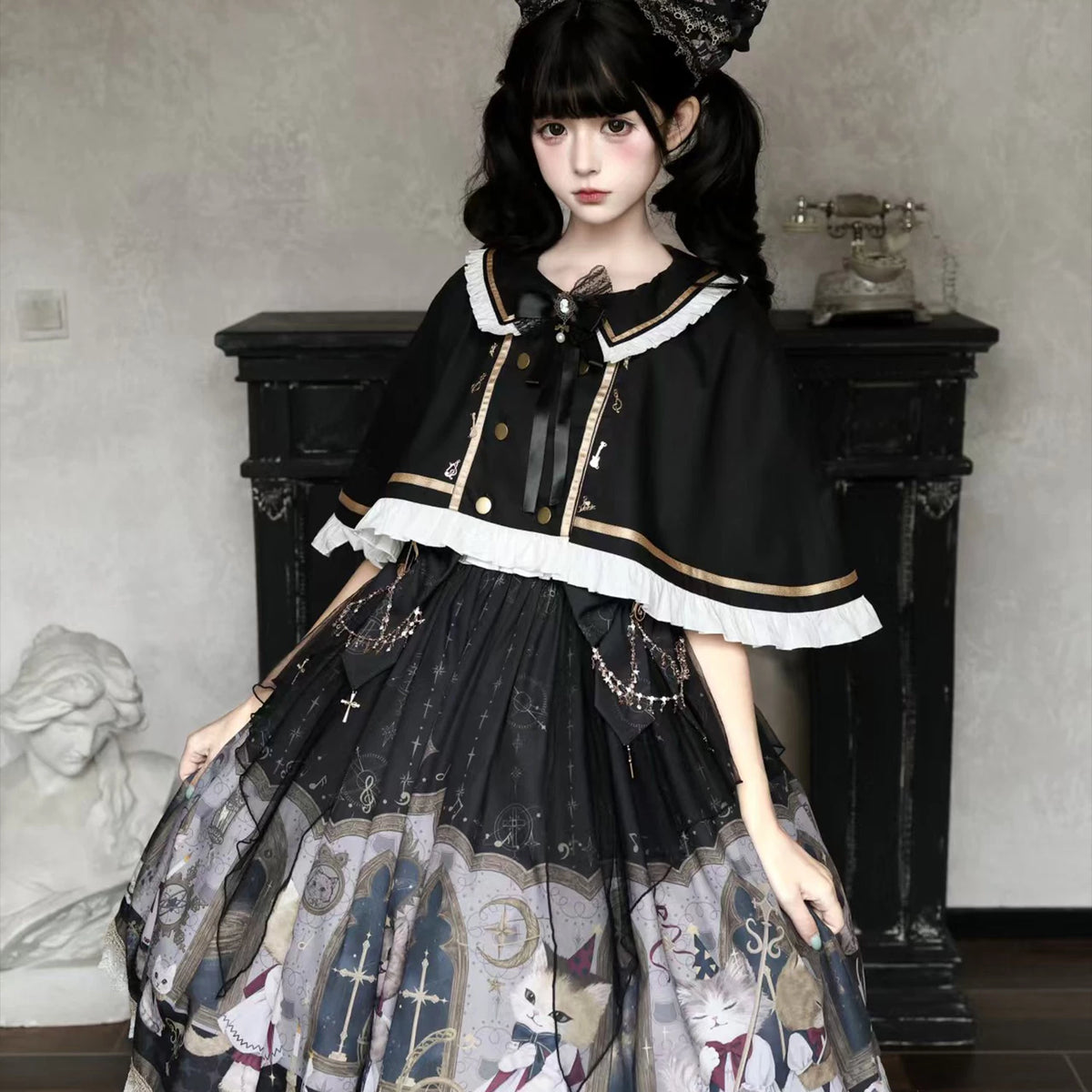 Front view of Cat Choir white-lace cape over the printed JSK dress