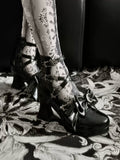 Moonlit Coffin Glossy Black platform heels, styled side view by Sphenoid