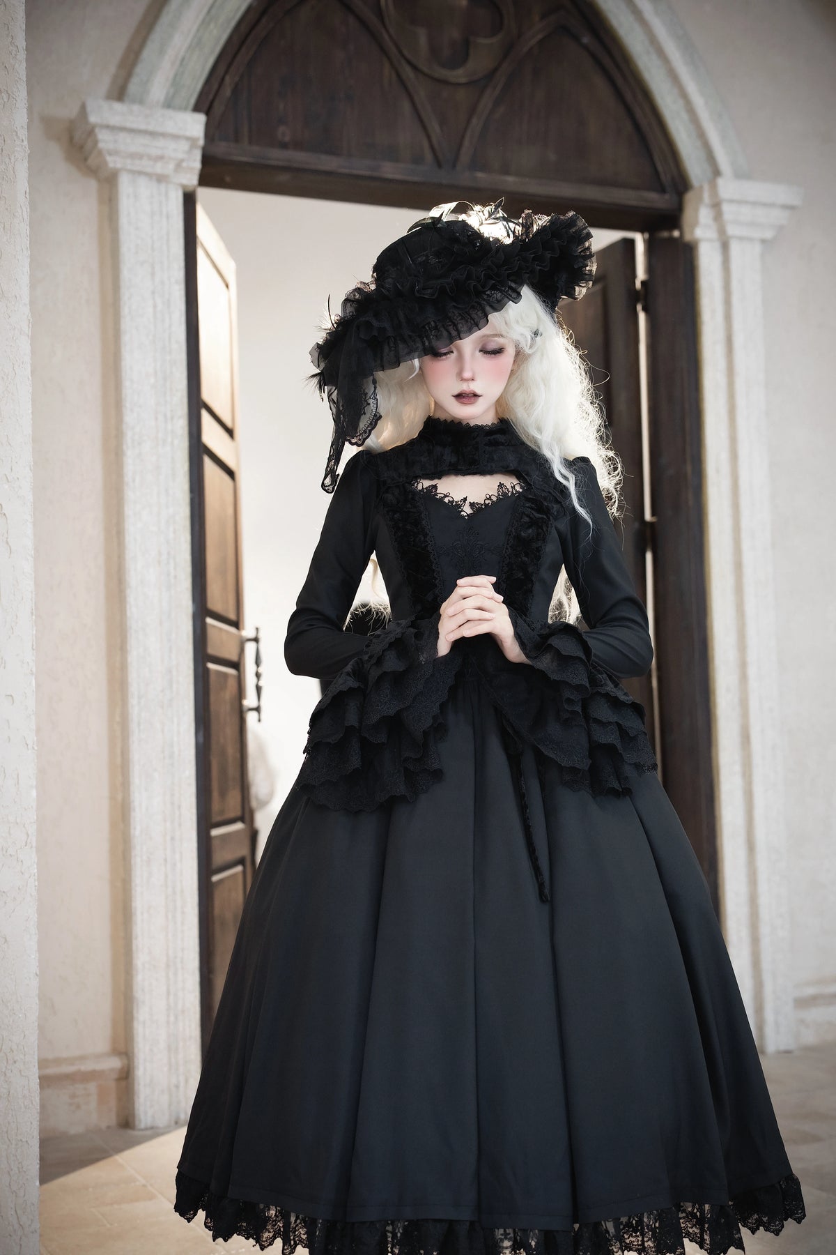Side view of the black Gothic Lolita dress