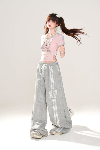 ロゴスポーティフローラルTシャツアート