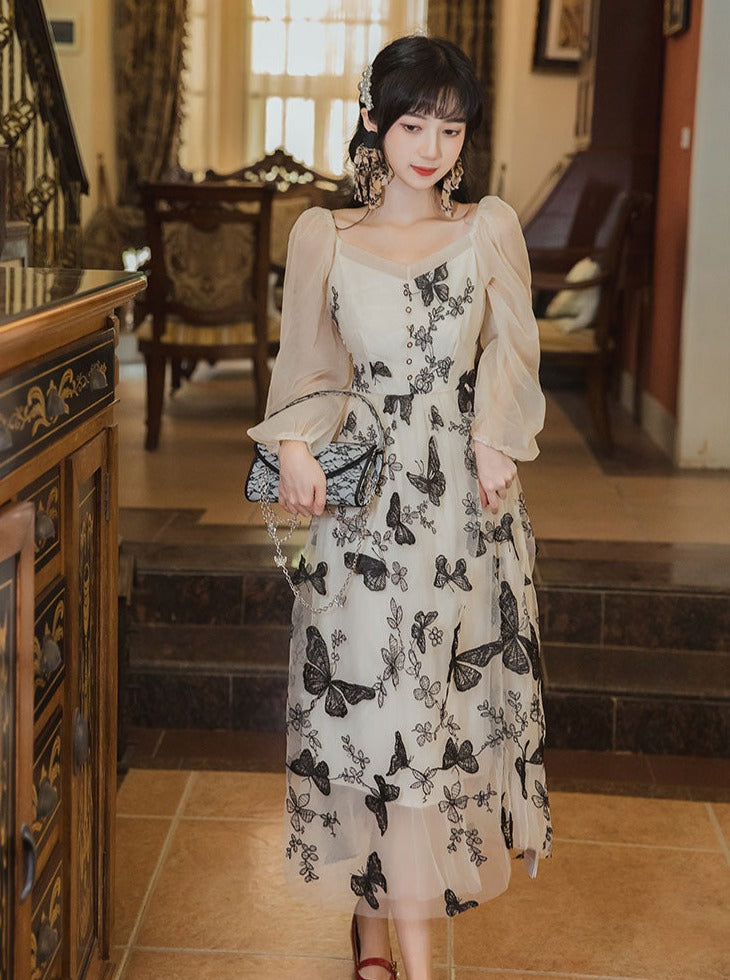 Transparentes Schmetterlings-Chic-Kleid Retro