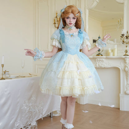Blue-Green short OP Lolita dress worn with coordinating accessories