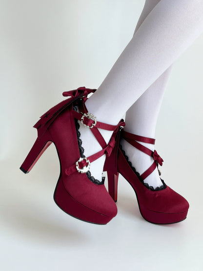 Holy Relic Cross burgundy platform heels worn with crossover straps