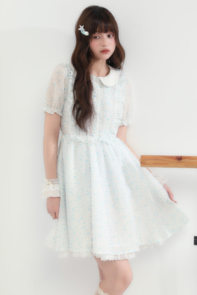 Puppe Ecosta Blumenkleid transparent