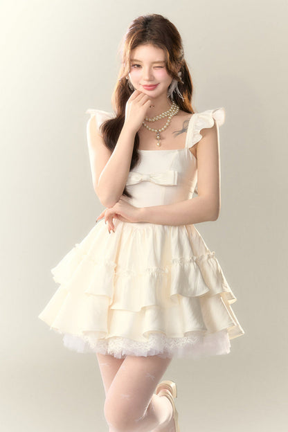 Fliegendes Cremefarbenes Kleid mit Spitzenärmeln und Puffärmeln