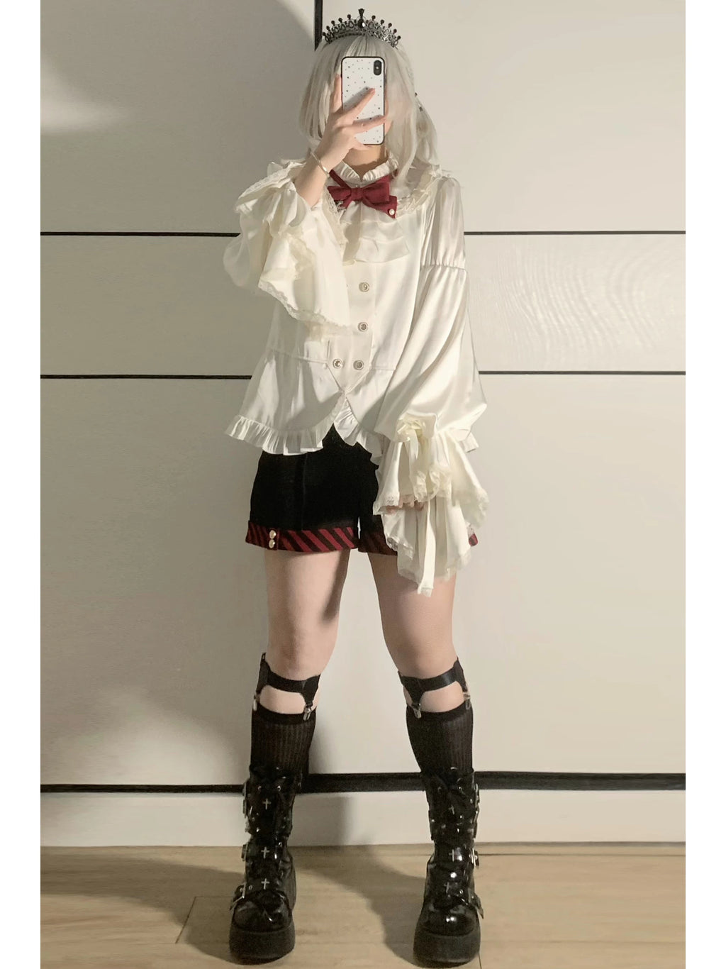 Front styling view of the Crusader Cross blouse and shorts
