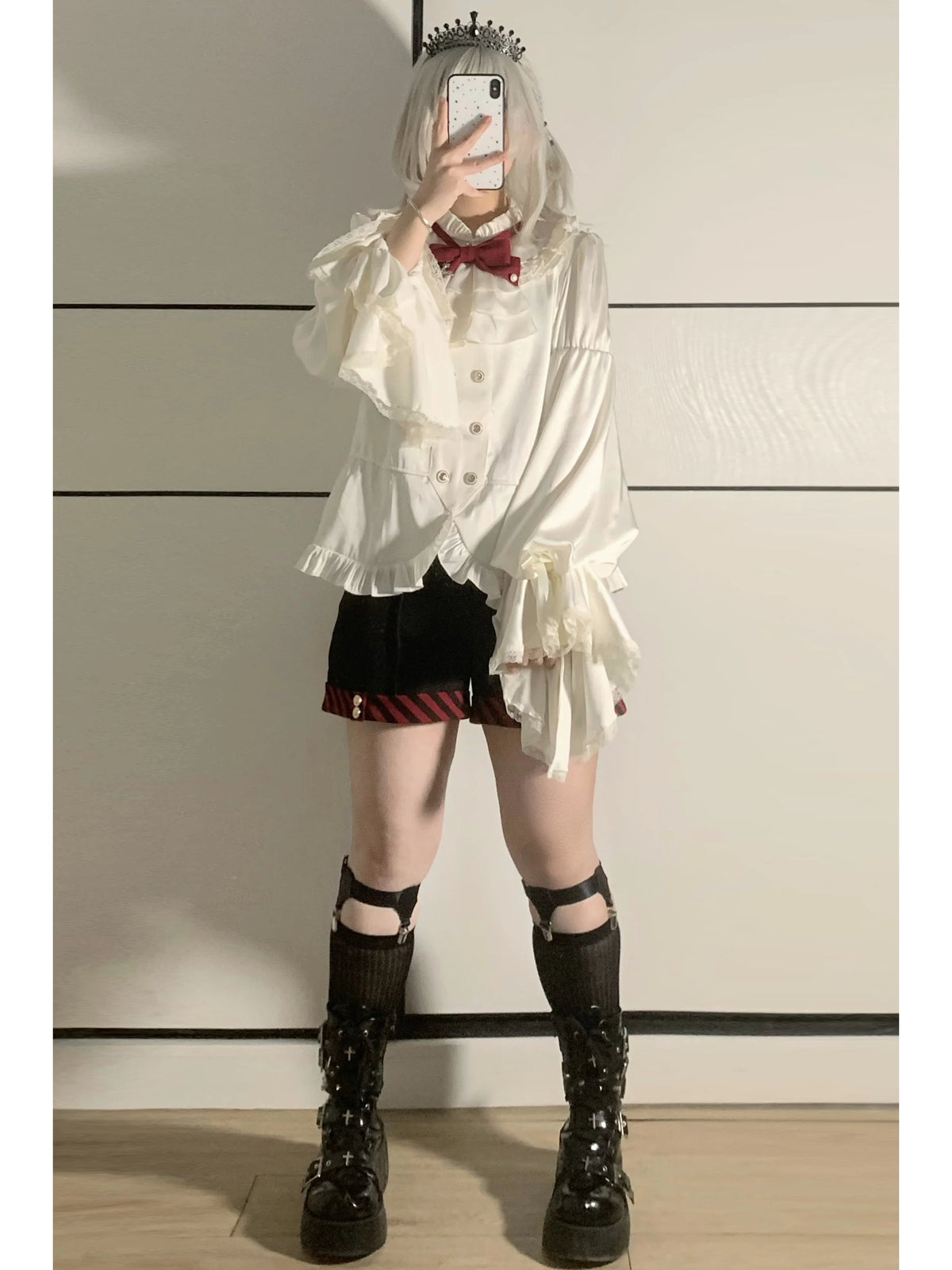 Front styling view of the Crusader Cross blouse and shorts