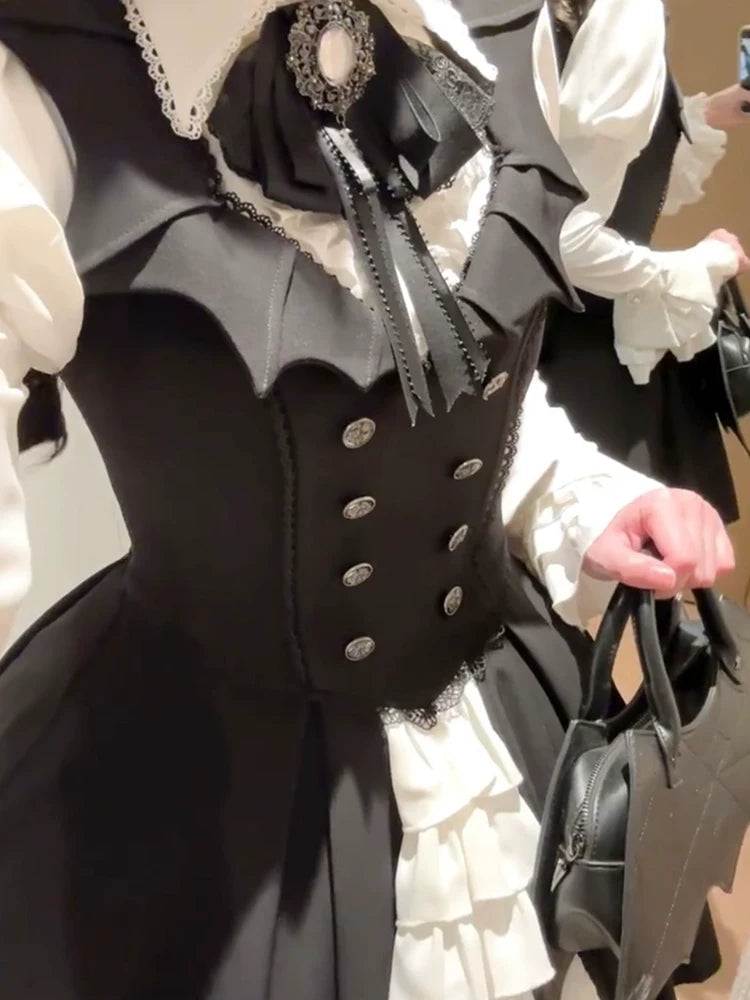 Close-up of bat-wing neckline and buttoned bodice