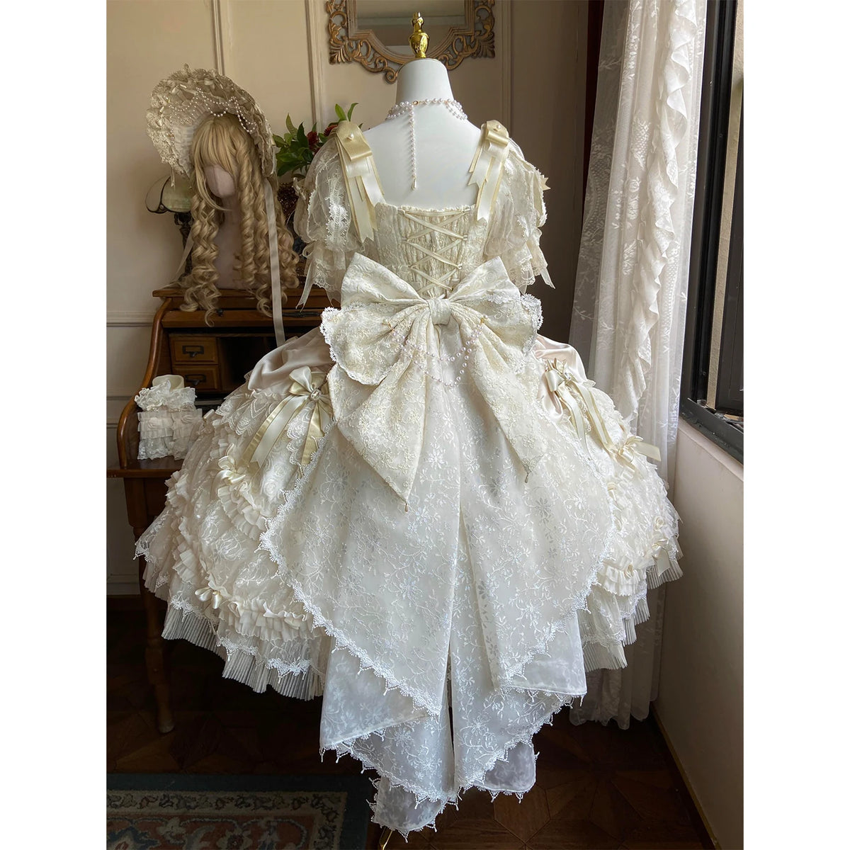 Back bow and lace train on the Gilded Dream dress