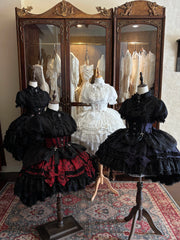 Cross Spider Bow Gothic Lolita coordinates displayed on mannequins