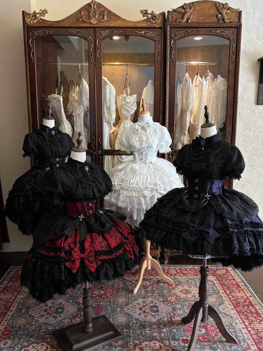 Cross Spider Bow Gothic Lolita coordinates displayed on mannequins