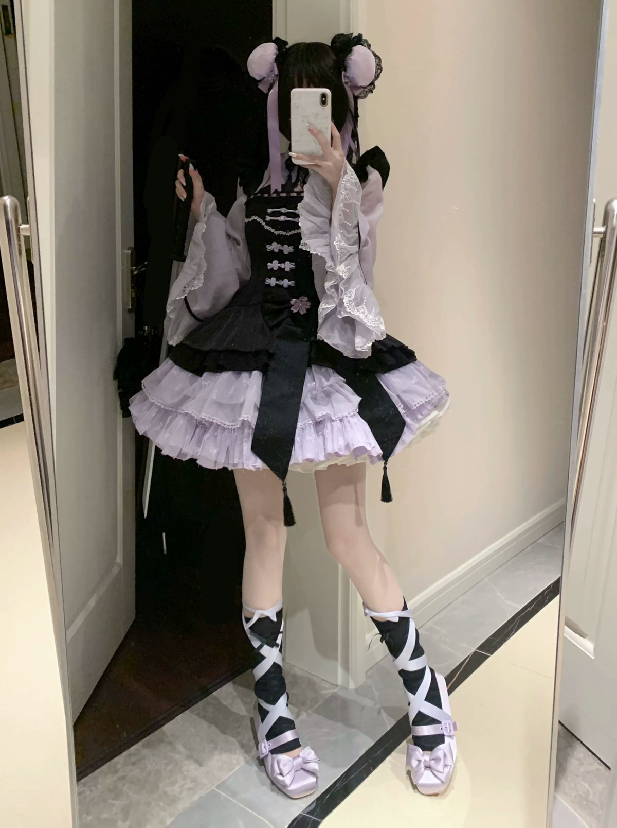 Full-length view of the black and purple Chanhua Xu coordinate