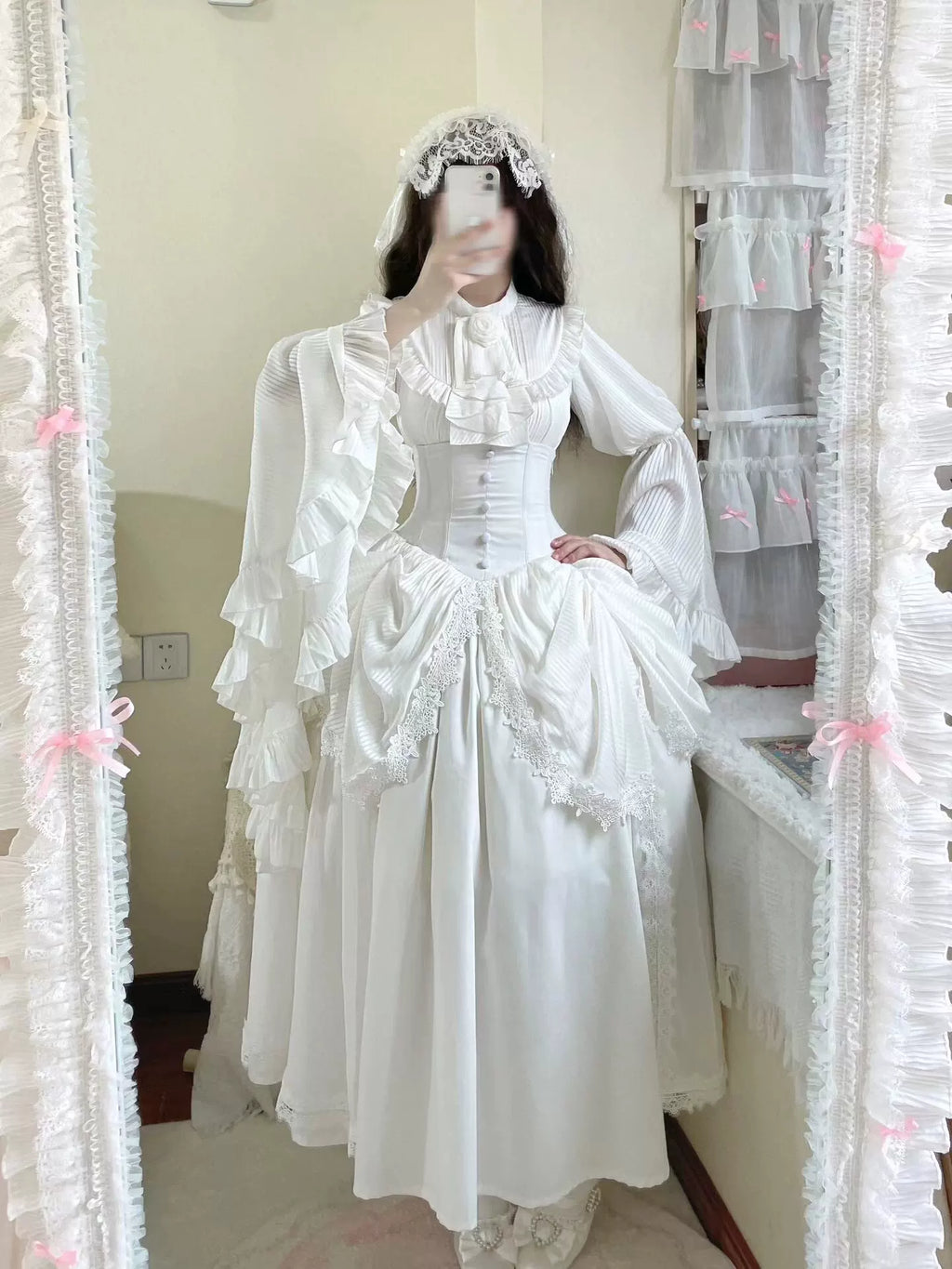 White Gothic Lolita blouse and high-waist skirt worn together