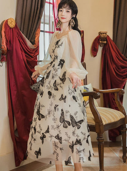 Transparentes Schmetterlings-Chic-Kleid Retro