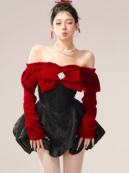 Schulterfreies Kleid mit großer Schleife und Center Jewel