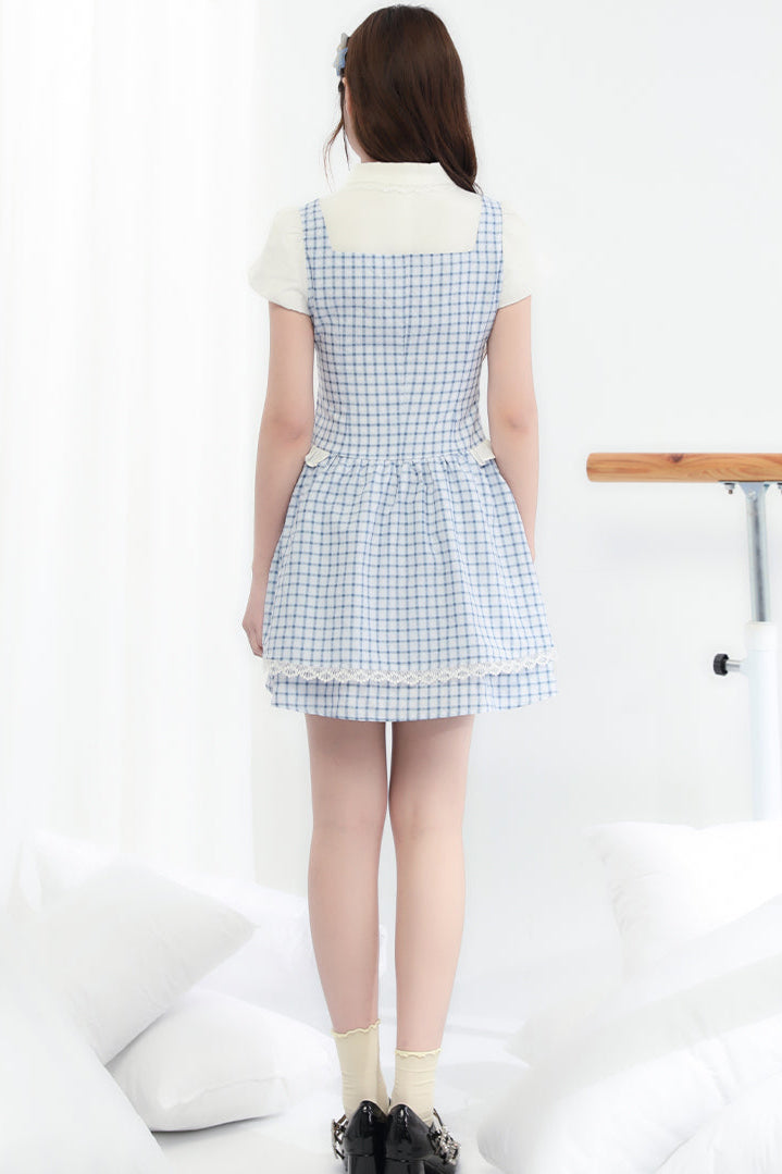 Süßes kariertes blaues College-Kleid