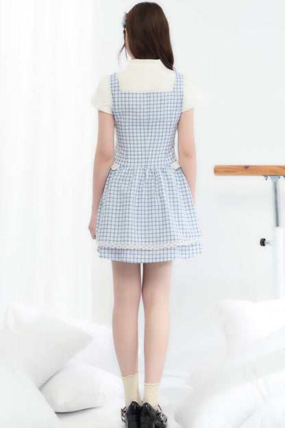 Süßes kariertes blaues College-Kleid