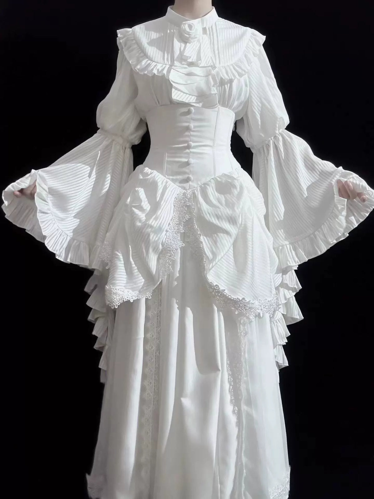 White blouse and skirt with ruffled decorative bib