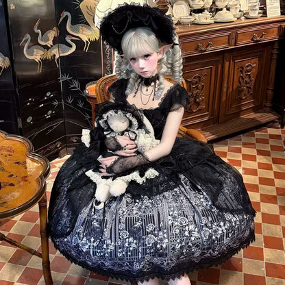 Black Gothic Lolita JSK dress styling on seated model