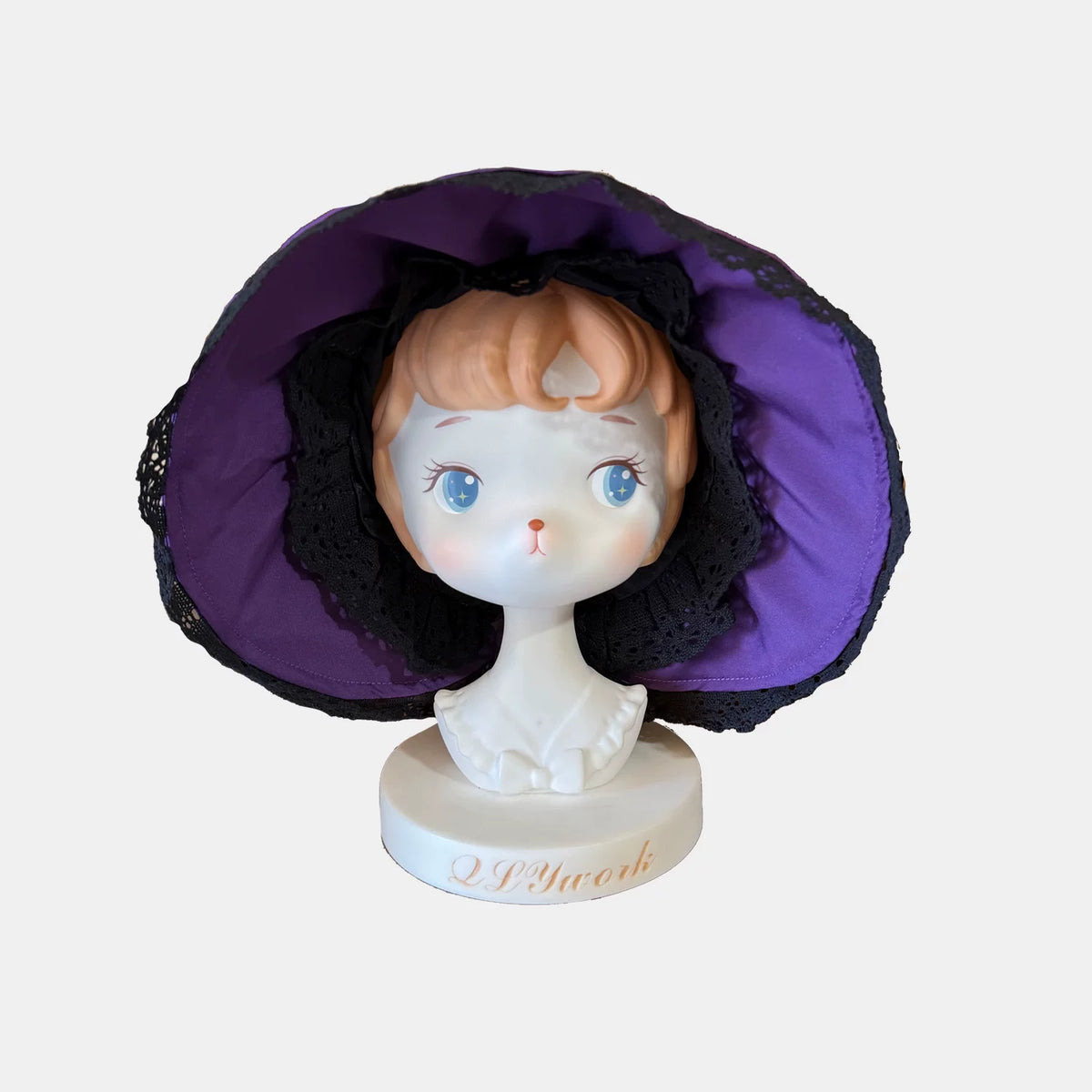 Purple Lace Bonnet shown separately on a display stand