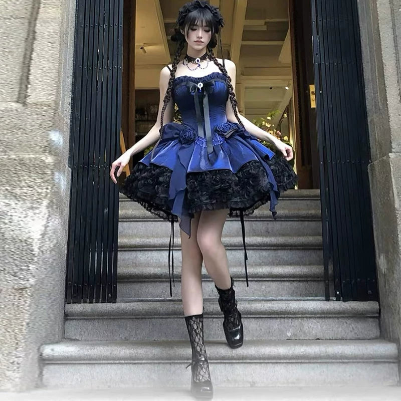 Blue princess dress styled outdoors on stone steps