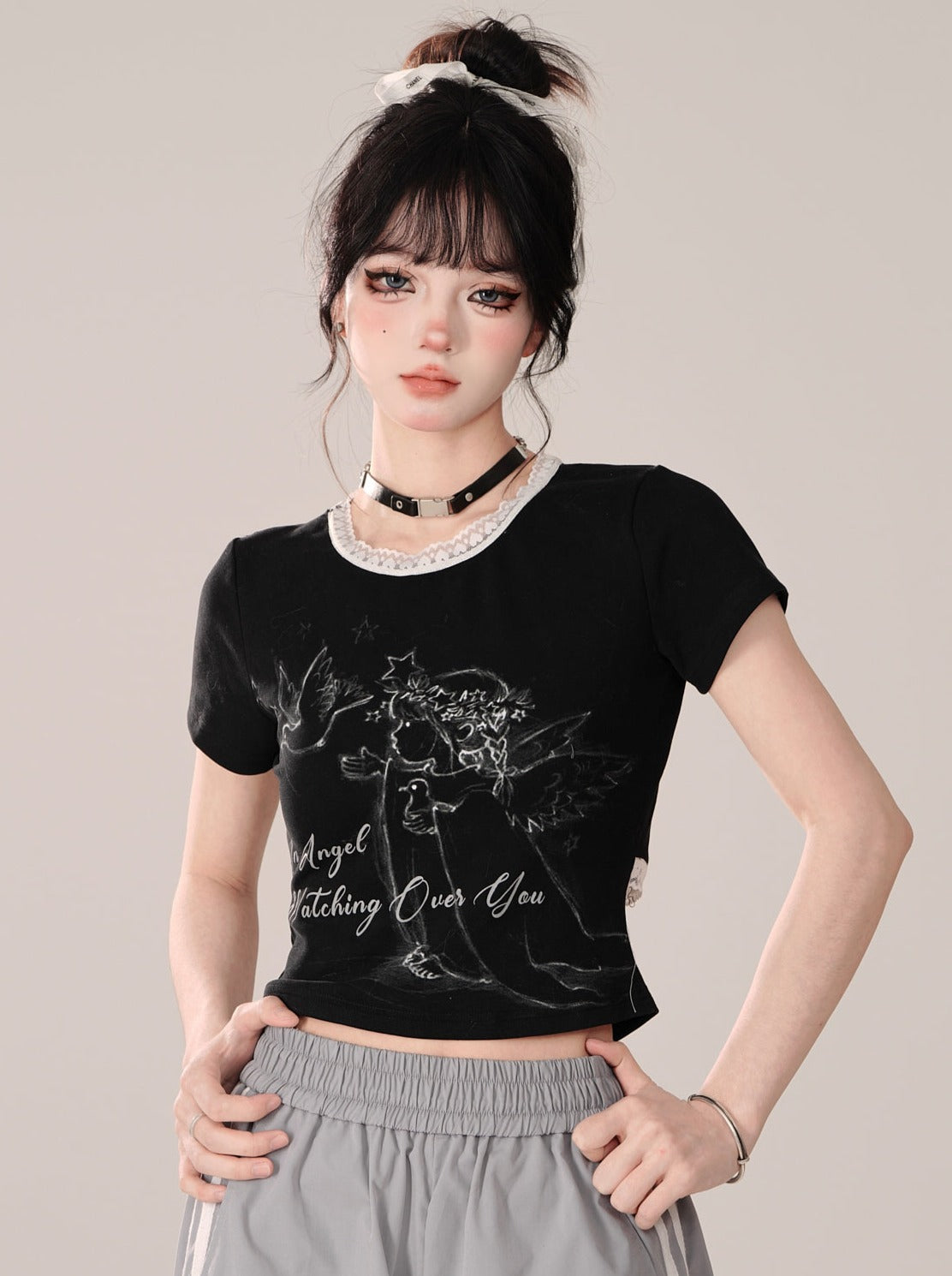 Schwarze Oberteile mit kurzem Design von Little Short Angel