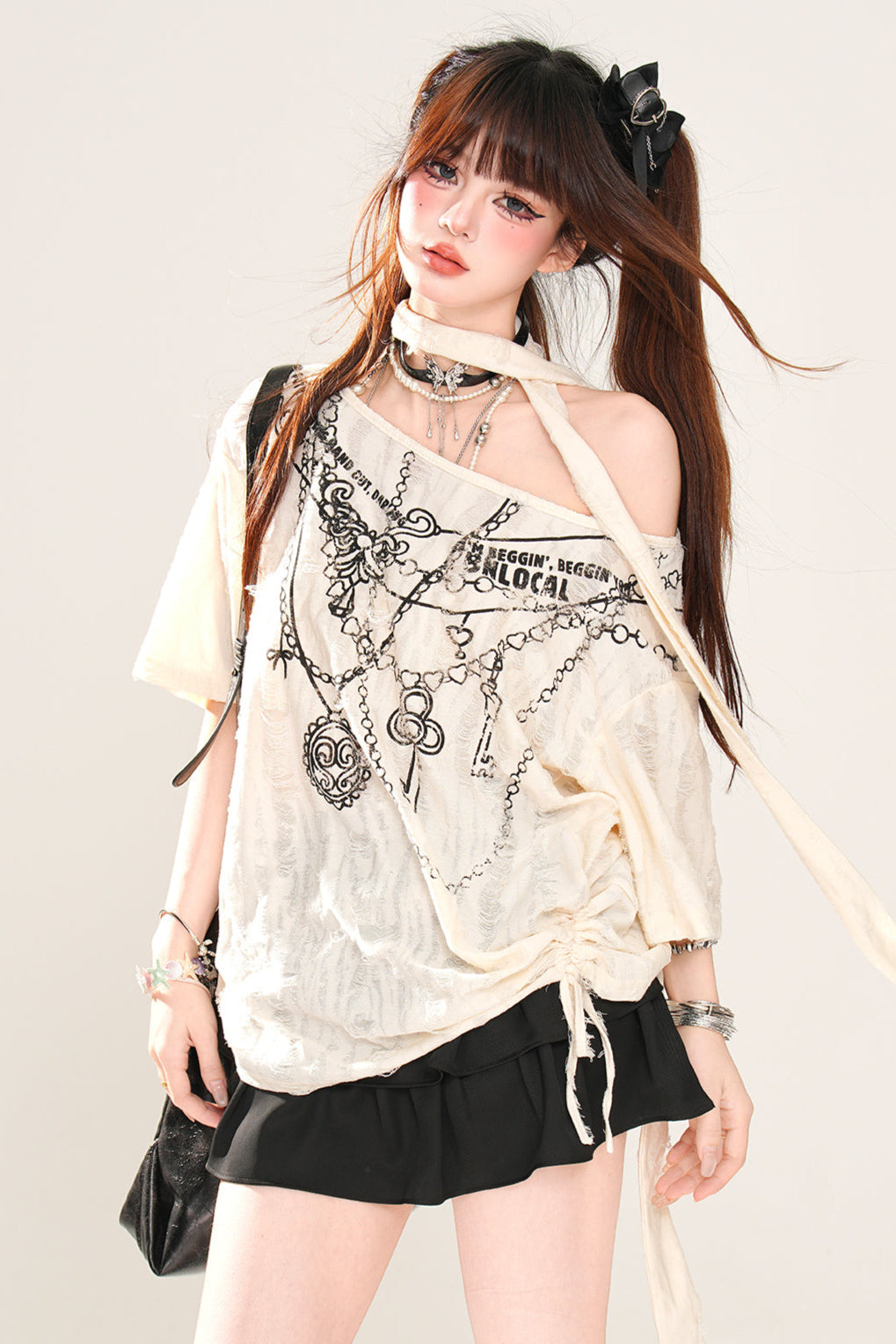 ワンショルダーのゆったりトップス Mine