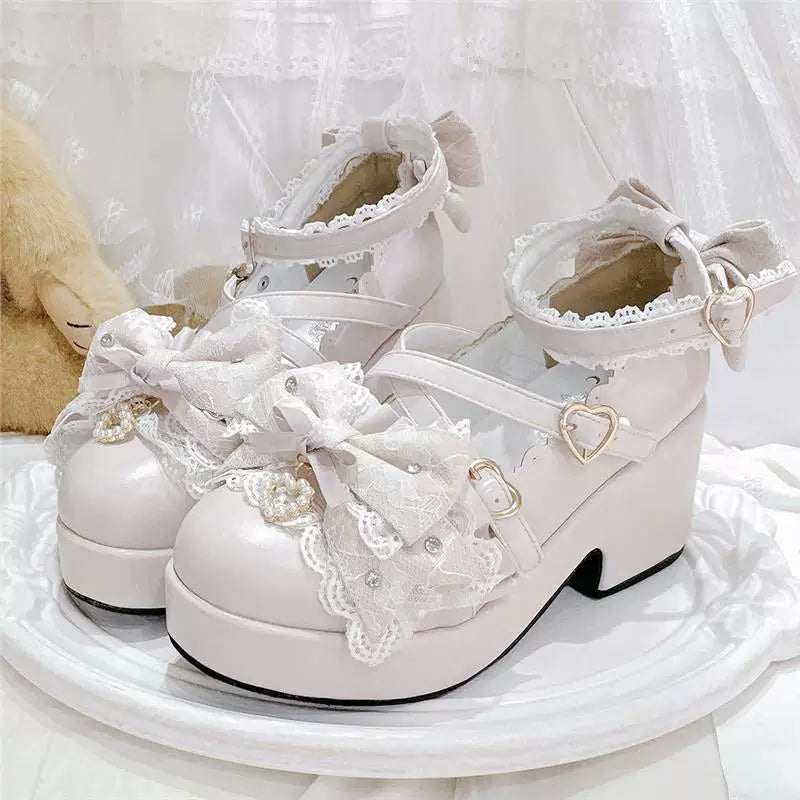 Pink bow platform Mary Jane shoes on display