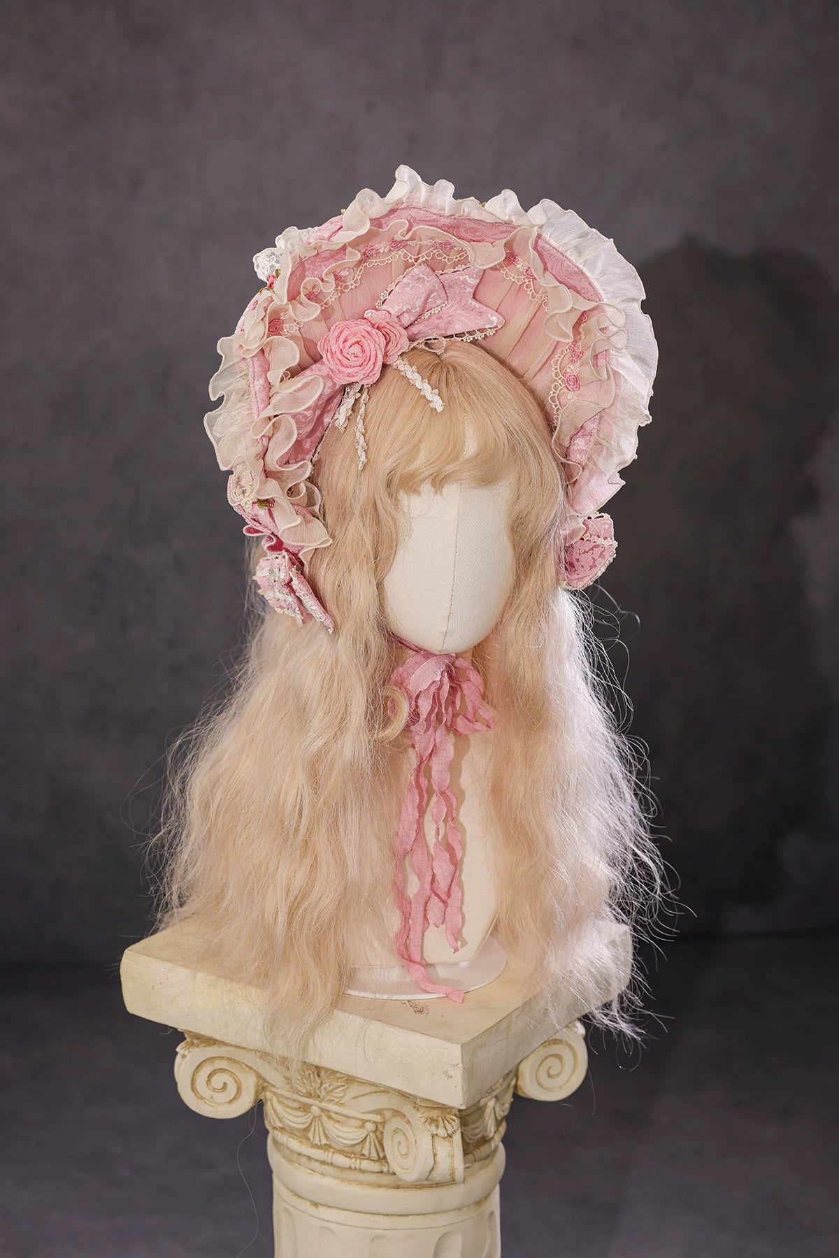 Antique Cake Romantic Whispers ruffled bonnet on display by BR Thorn Rose