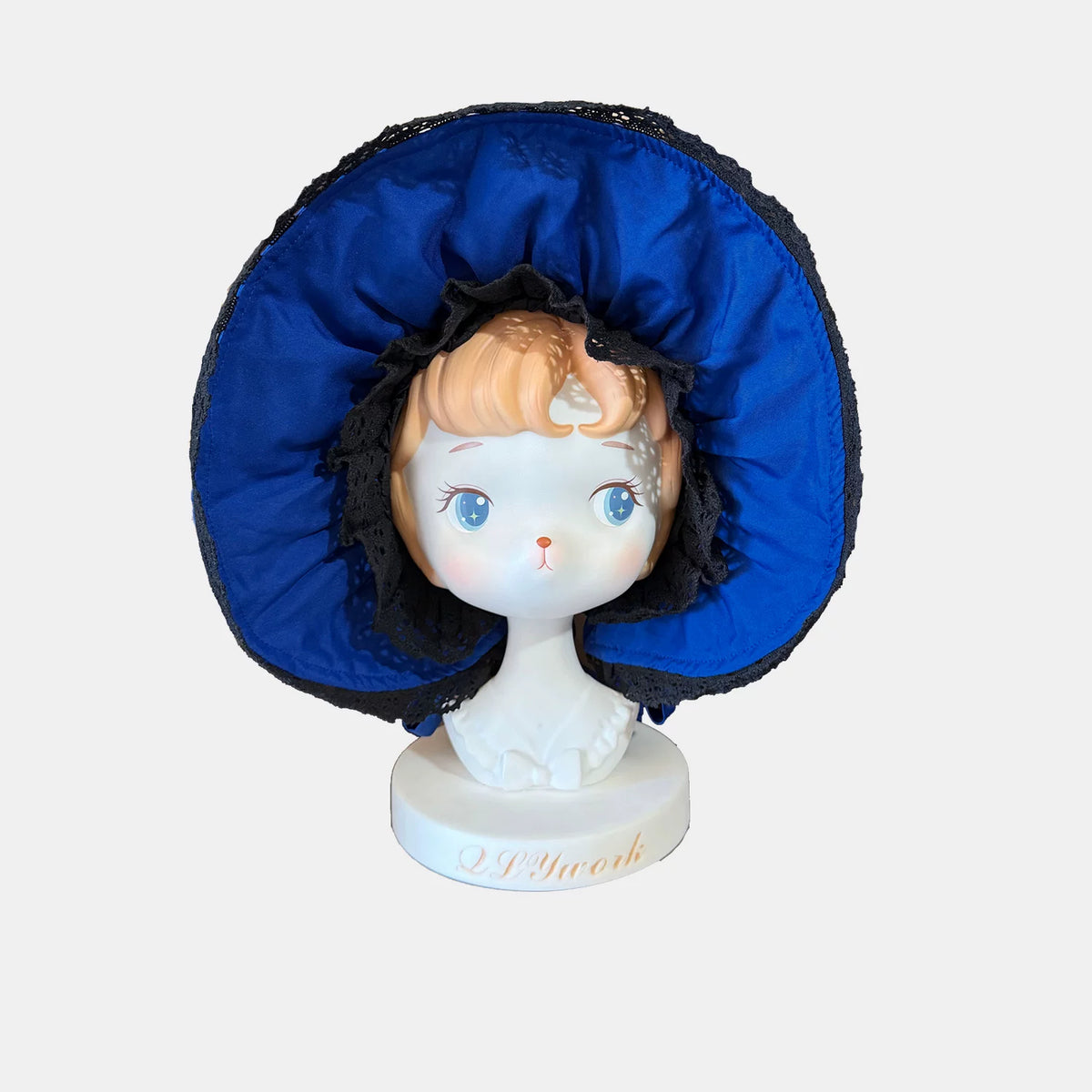 Blue Lace Bonnet shown separately on a display stand