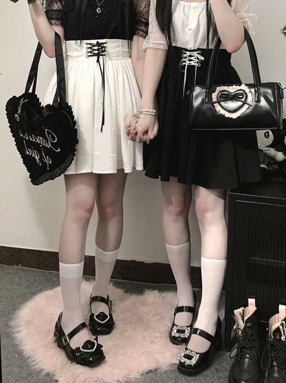 Hoch taillierter Jacquard-Rock mit Bändern