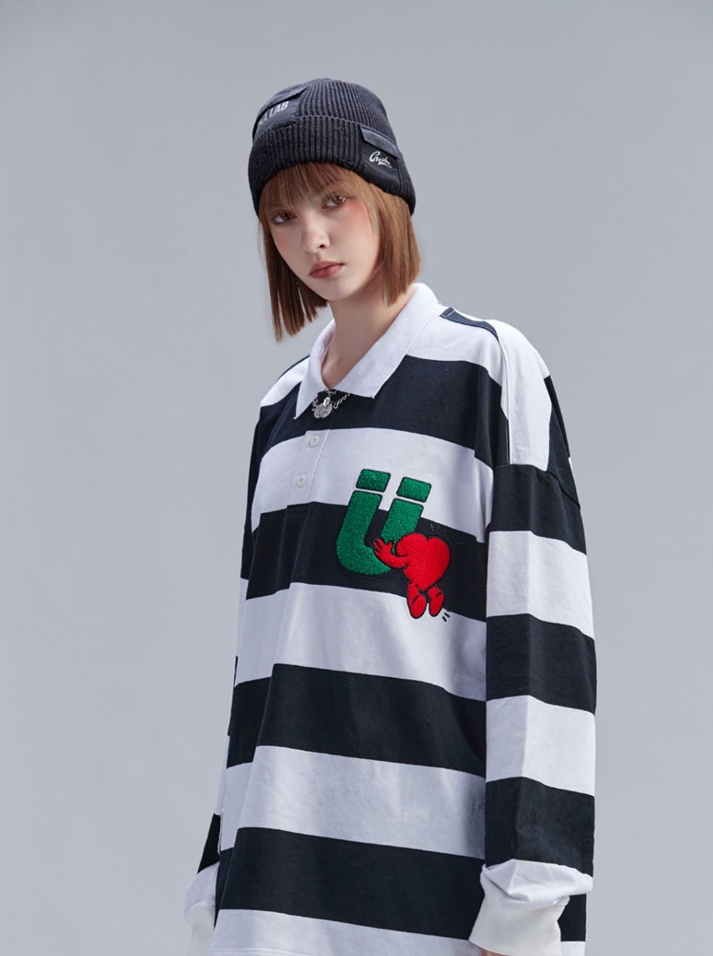 ゆったりとしたボーダー柄ビッグトップスポロ