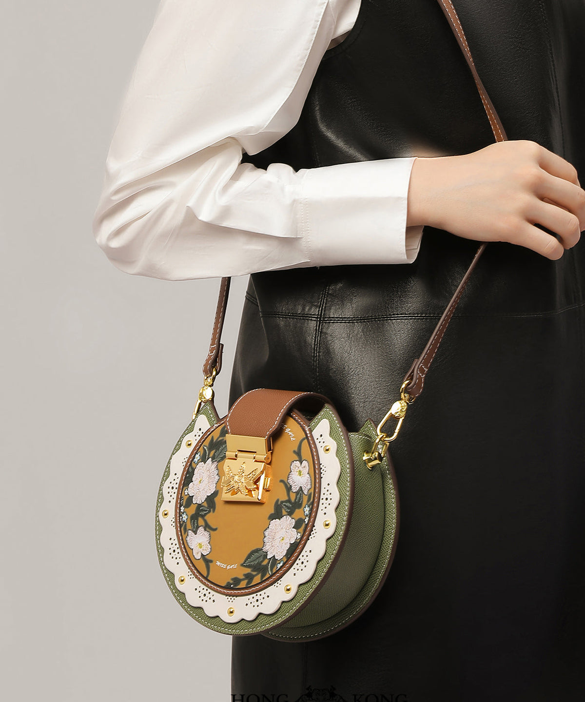 Satteltasche aus bedrucktem Kalbs-Patchwork-Leder Original Grünes Design
