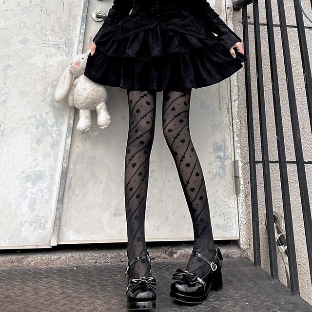 Strumpfhose mit Schleifenmuster und Herzen