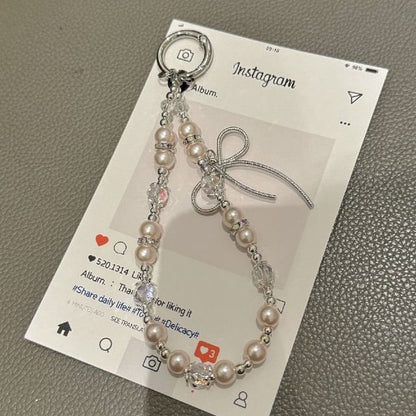 Schleifenpad mit Kunstperlen und Handy-Lanyard